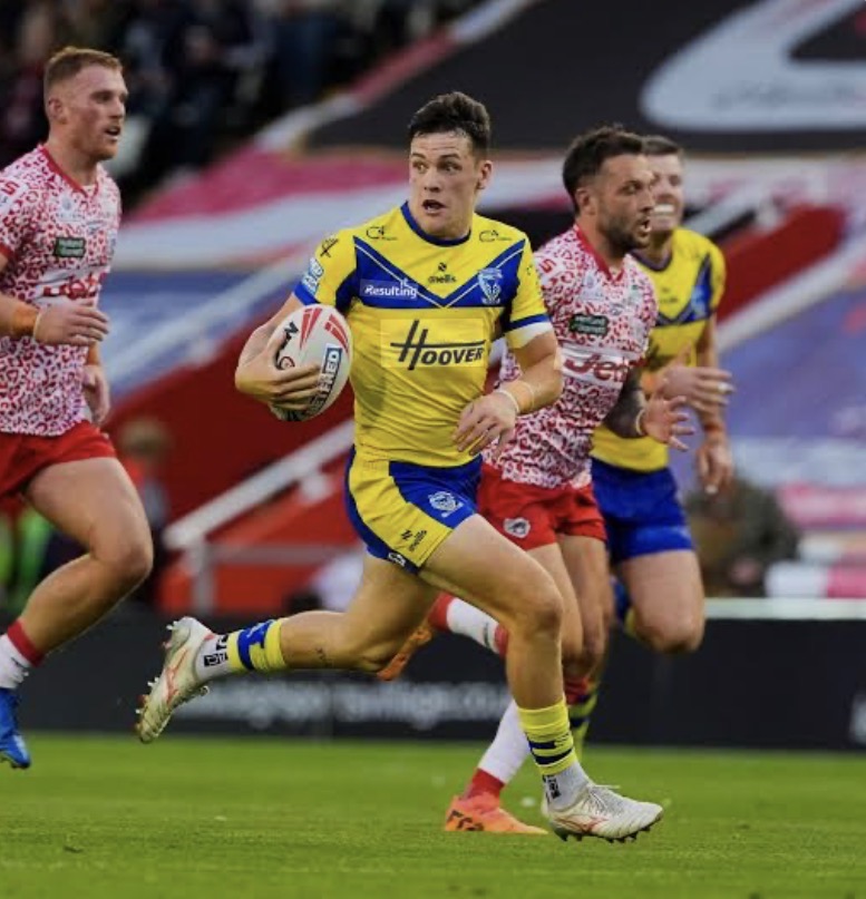 Warrington rugby league player running with the ball